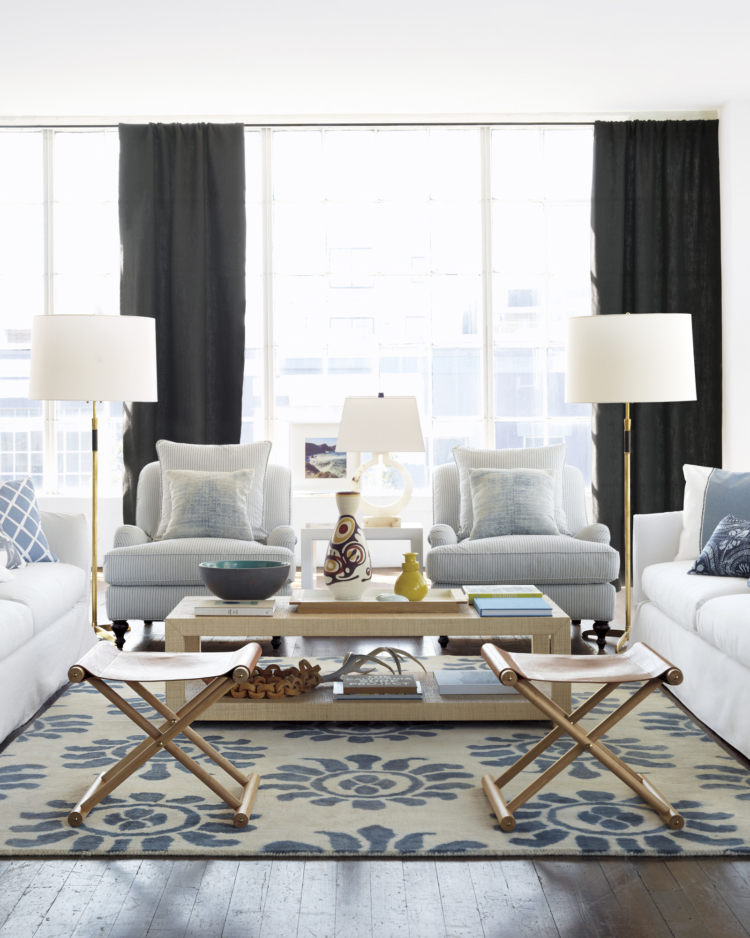 Good morning, chic reader friends.  Nothing says "bright and happy" quite like this fabulous room by our friend Kara Miller. This shows that woven texture in every room adds warmth and style. love the pair of floor lamps and blue and white color palette in this living room