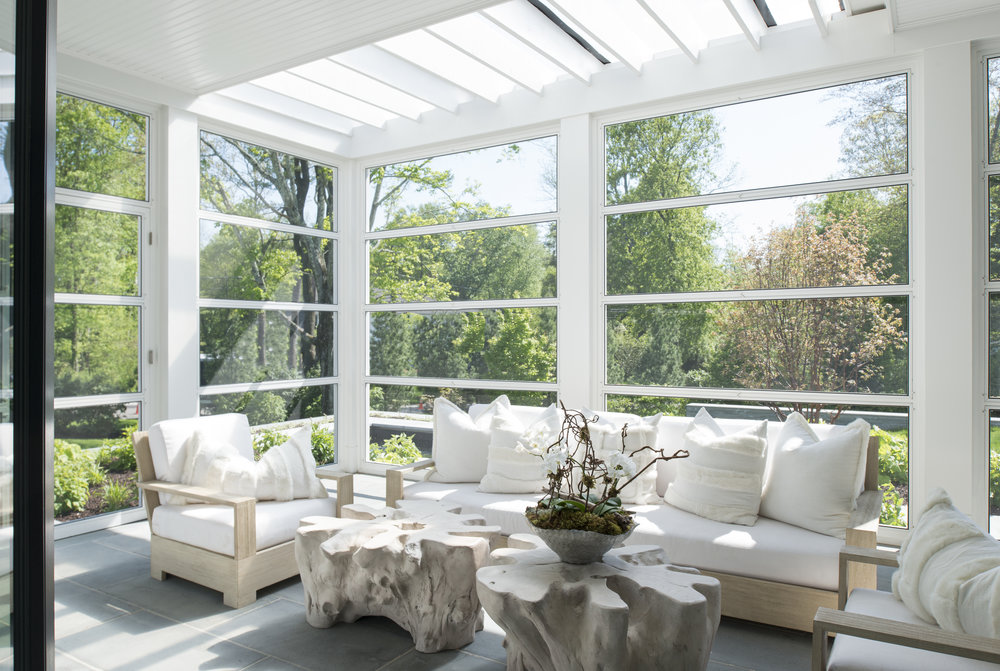 We are constantly in awe of huge talents like photographer Jane Beiles whose beautiful interior design photography captures the true spirit of a home, bringing the world to life in a way that is positively mesmerizing -Design by Tori Legge for Stirling Mills Interior Design- Architecture: Brooks & Falotico - white furniture in sunroom -- neutral sunroom