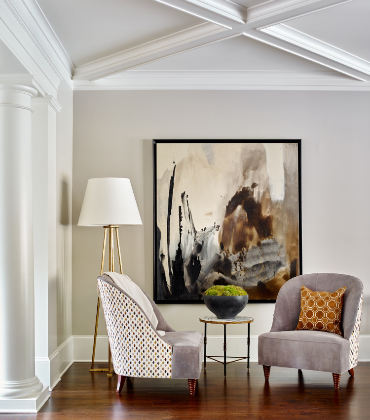 Harrison Design living room with floor lamp and abstract art