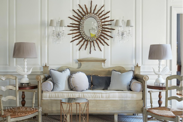 Georgian house with mirror over sofa in living room