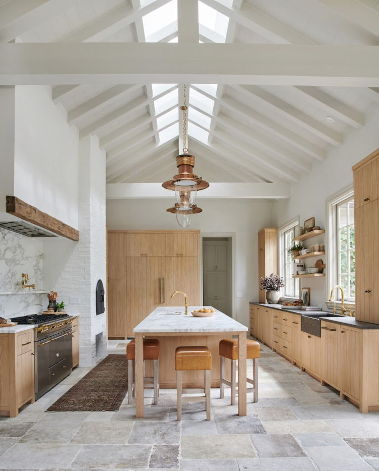 blonde wood cabinets in kitchen of Amber Interiors