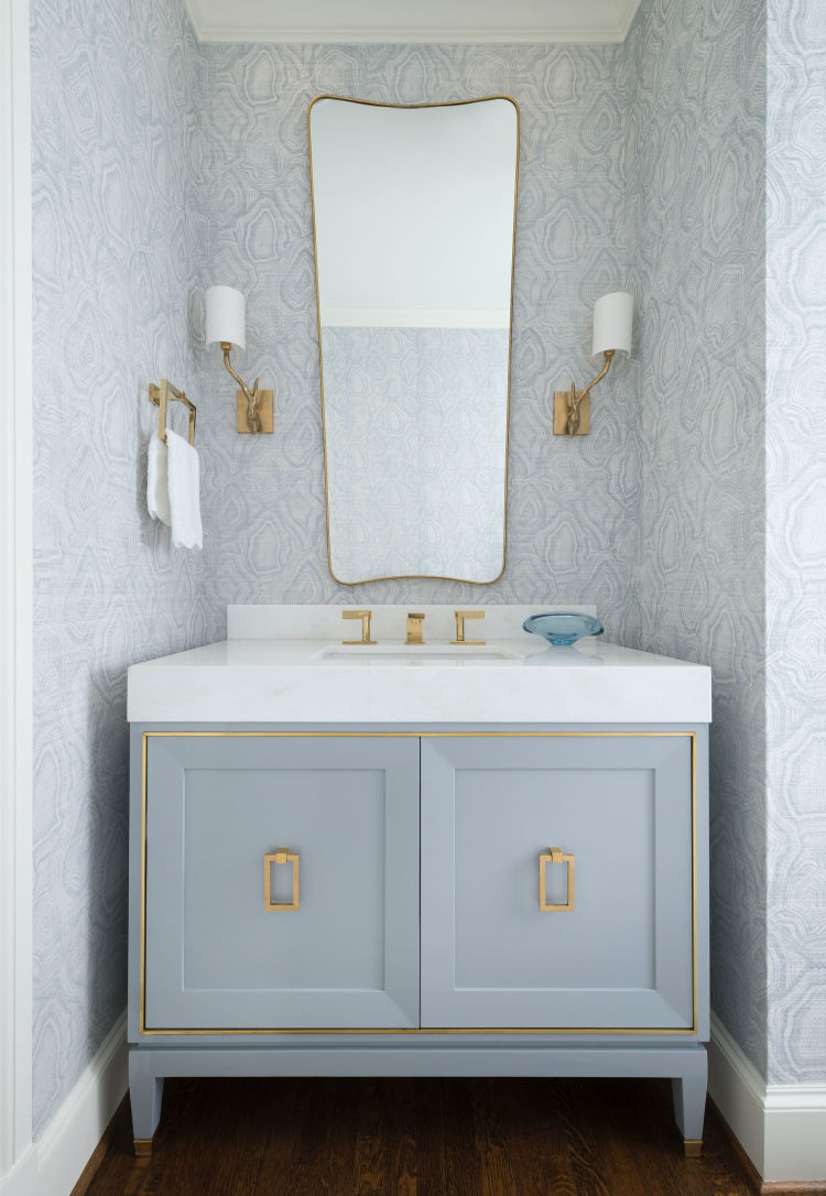 Jenkins Interiors blue and white wallpaper in tiny powder room