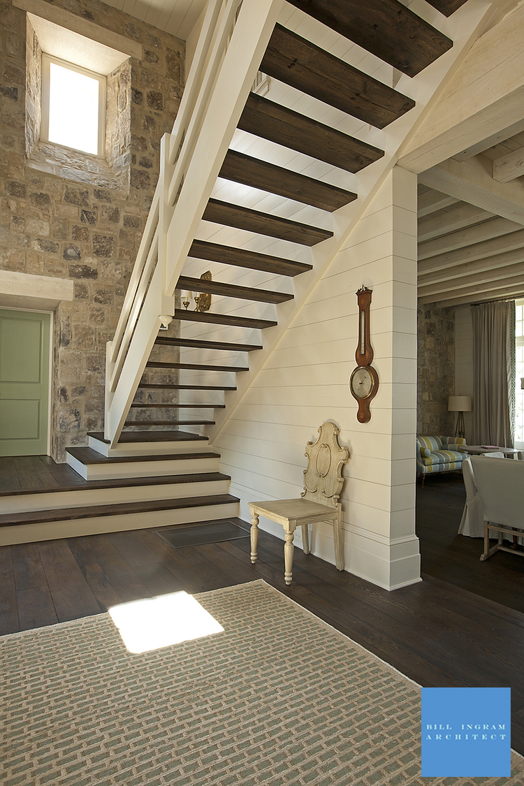 Bill Ingram Architect Lake Martin house entry with antique hanging clock