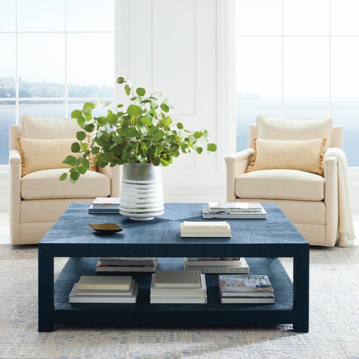 Serena & Lily living room with black coffee table and pair of chairs