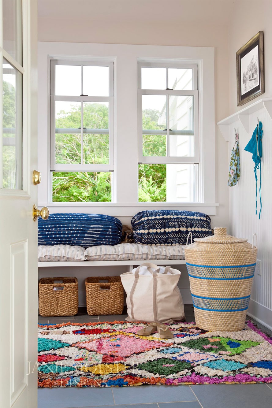 Fishing Bay mudroom - -So this stunning Fishing Bay house designed by Janie Molster (and Gordon Gregory Photography) seemed like a pretty fitting house to tour today. It's the perfect place to spend weekends for fishing right outside the door--and an equally fabulous place to curl up with a good book or get a little work done if you suddenly find yourself home alone during a grand fishing expedition. 