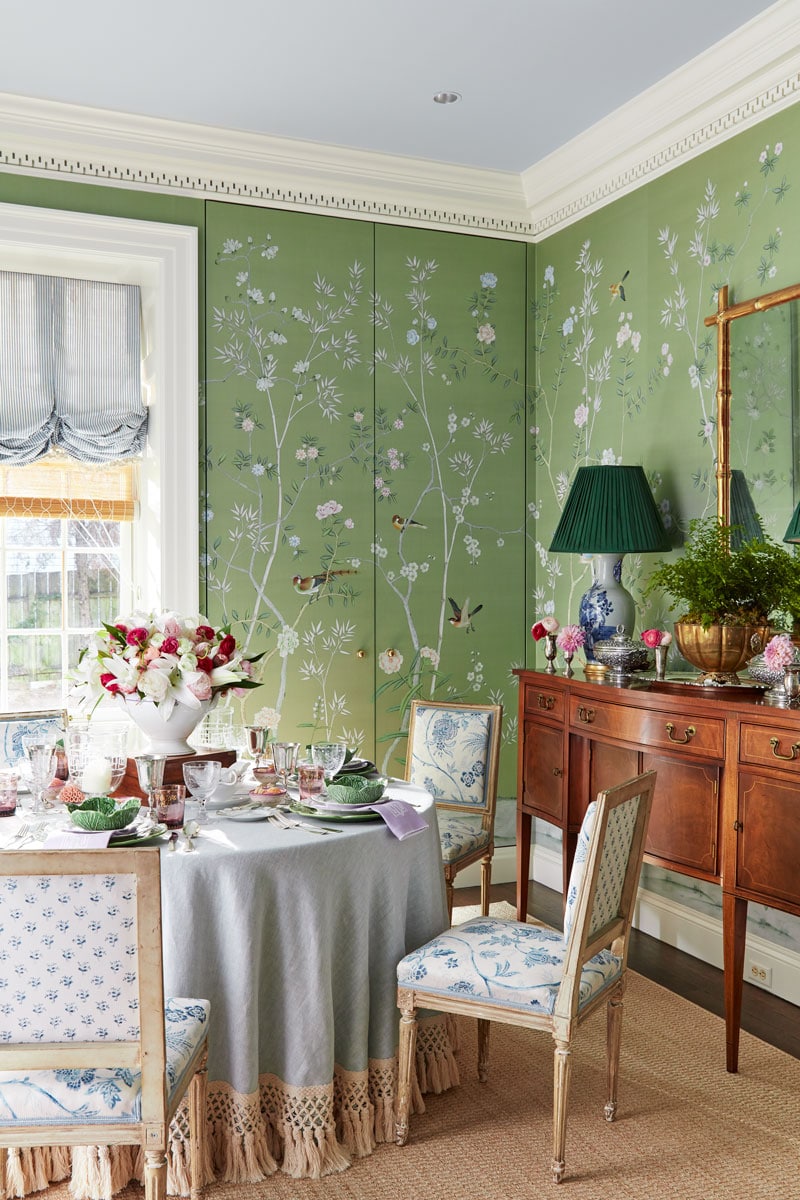 dining room with green and white wallpaper