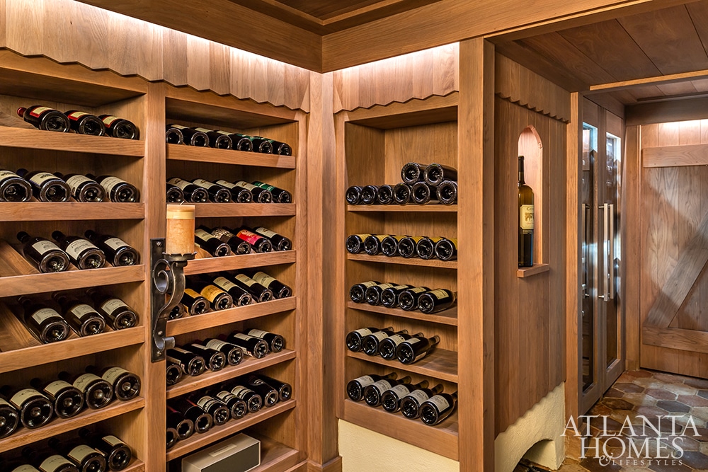 Beth Erin Designed Buckhead home wine cellar -Beth Erin Designed Buckhead home curb appeal white brickAtlanta Homes & Lifestyles Beth Ervin Interior Design Norman Askins Architect Jeff Herr Photography Jonathan Bussell Landscape Design!