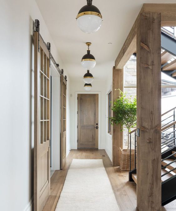 Studio mcgee hallway with pendant lights