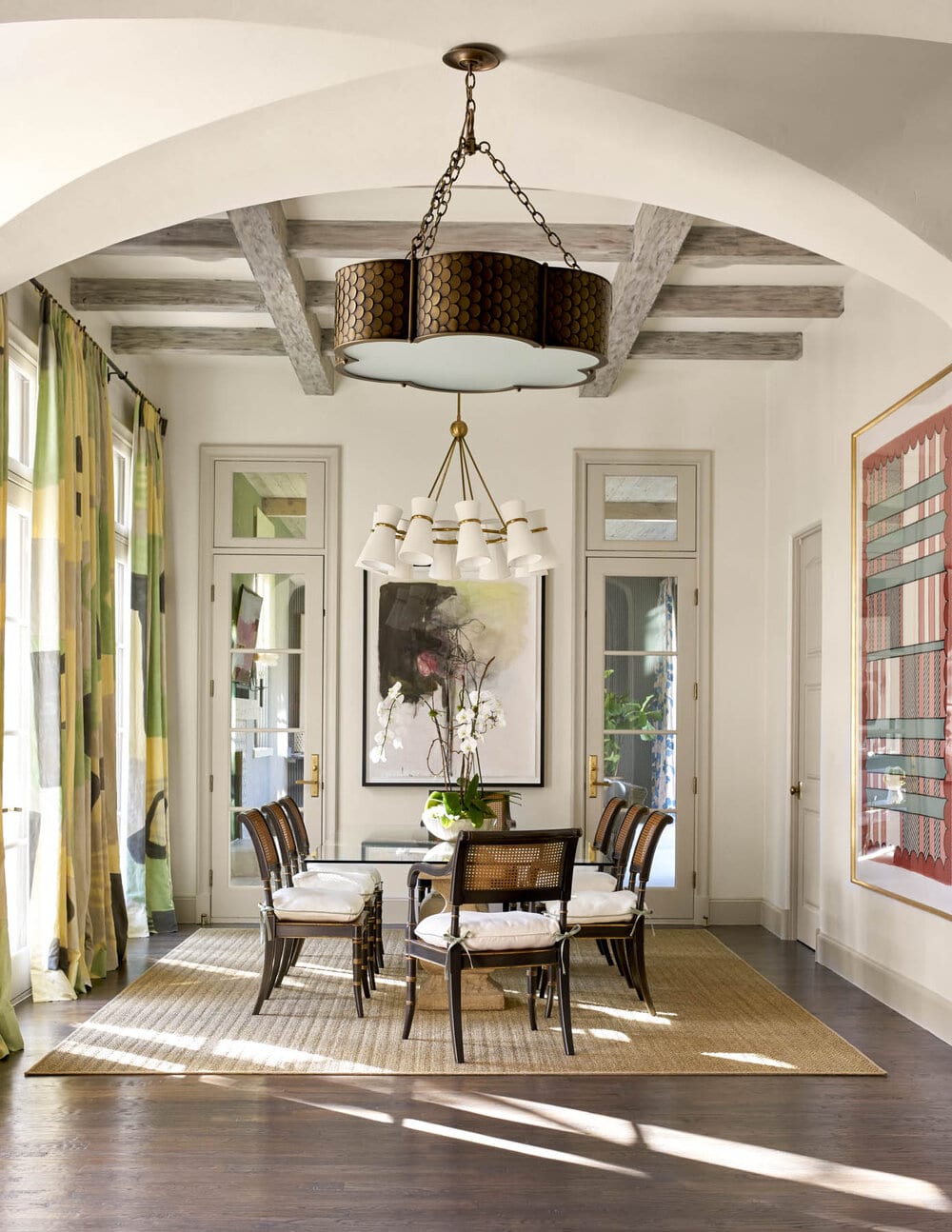 dining room with beams