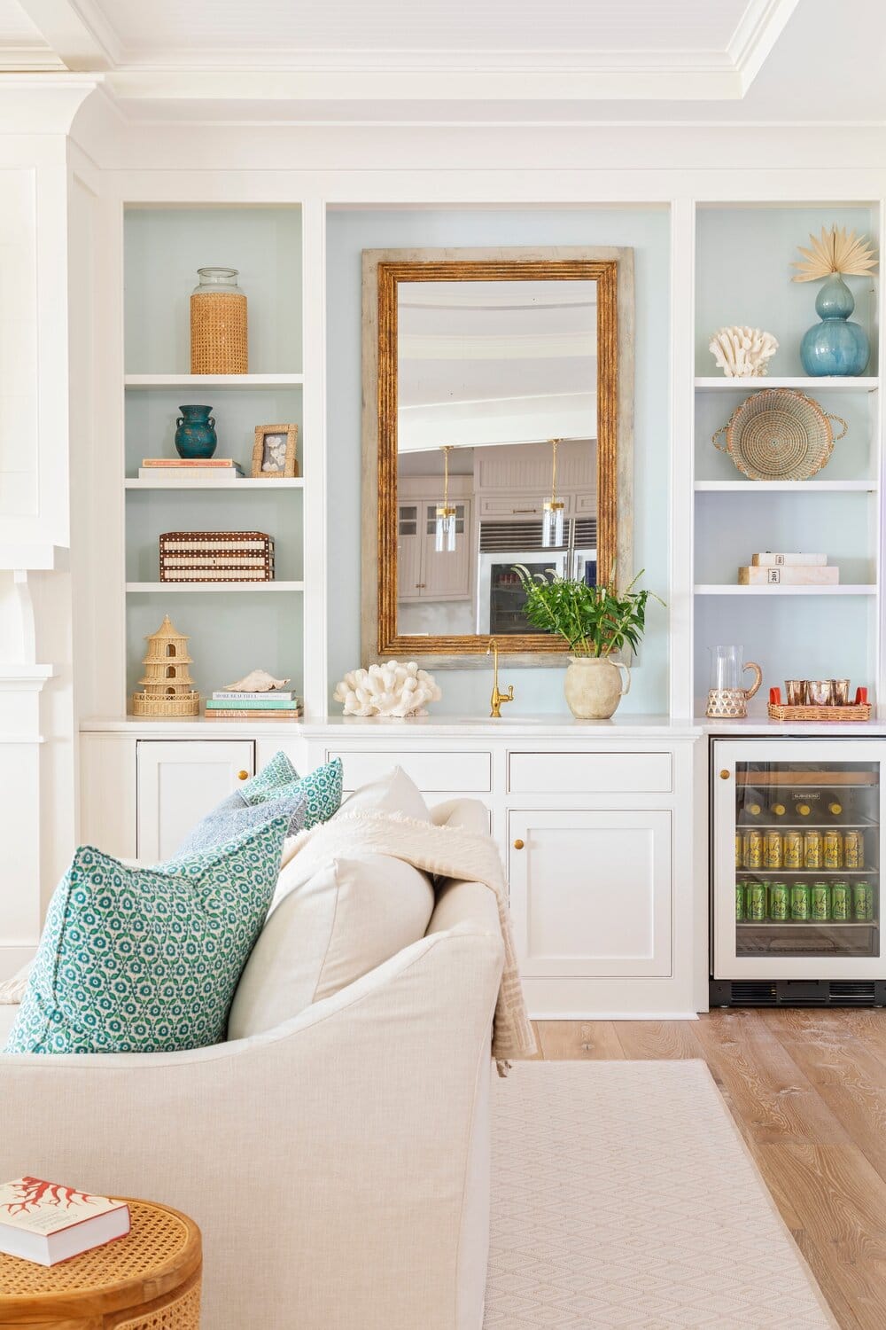 Isle of Palms house tour - Allison Elebash - Julia Lynn Photography -living room - blue and white - wet bar - stocking the bar