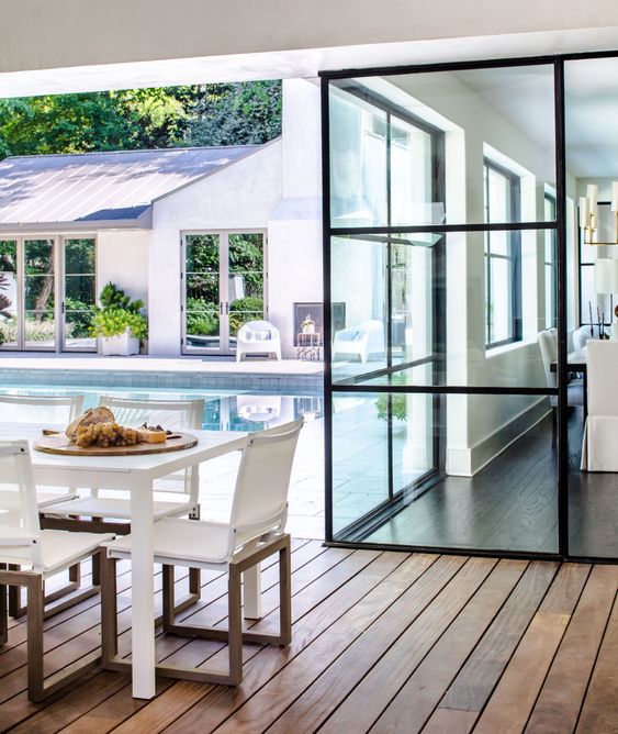 Nancy Duffey Interiors | Jeff Herr Photography outdoor area with pool and covered porch
