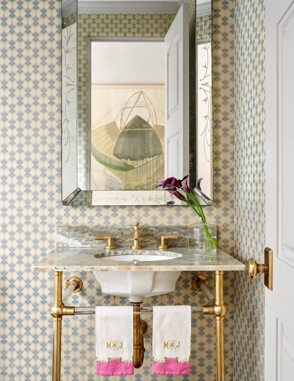 Beautiful interior design from Designer Mary Beth Williams | Photography Nathan Schroder. Love the powder room with the abstract wallpaper and the brass console sink with brass fixtures