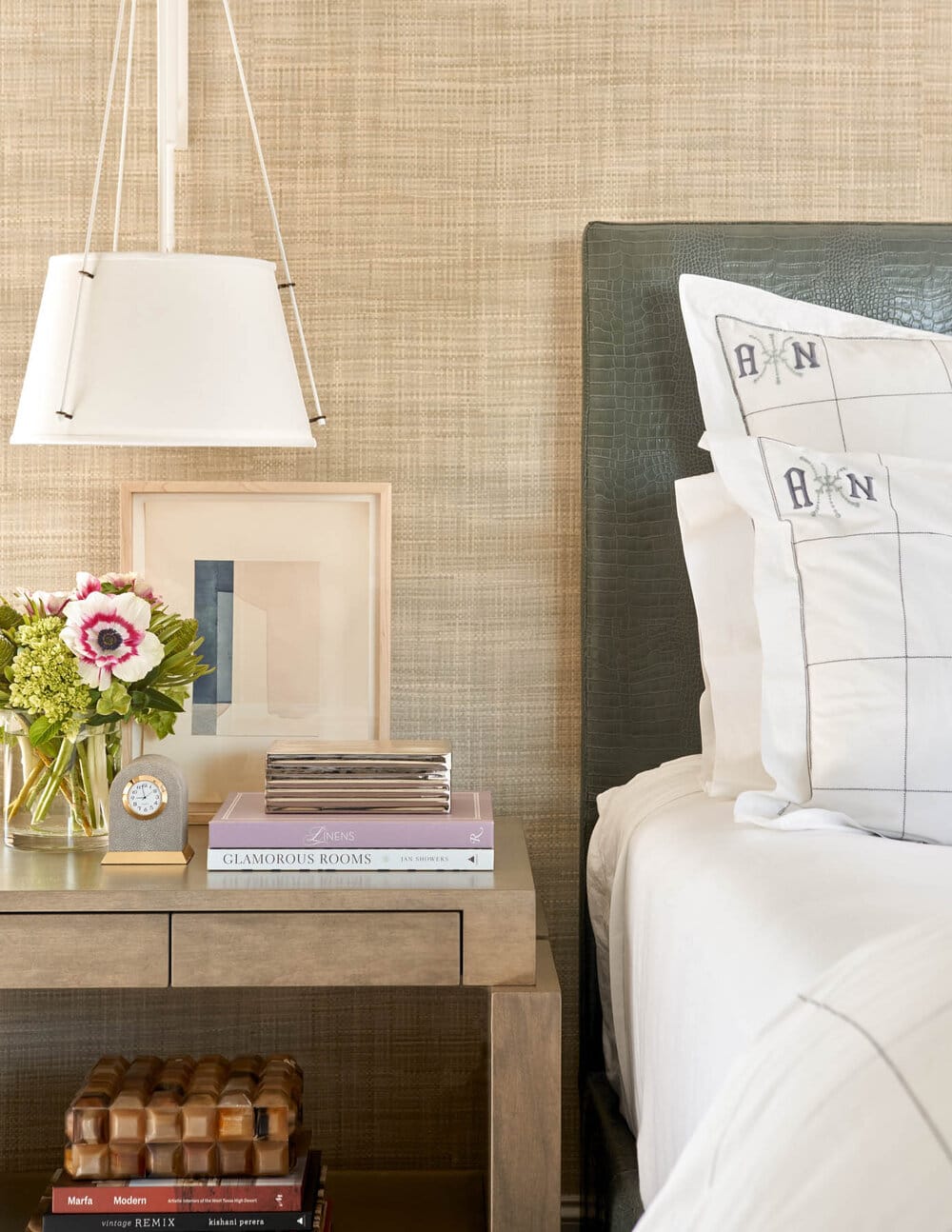 Delightful Dallas home from Designer Mary Beth Williams | Photography Nathan Schroder. Love the primary bedroom with the textured wallpaper and neutral decor. 
