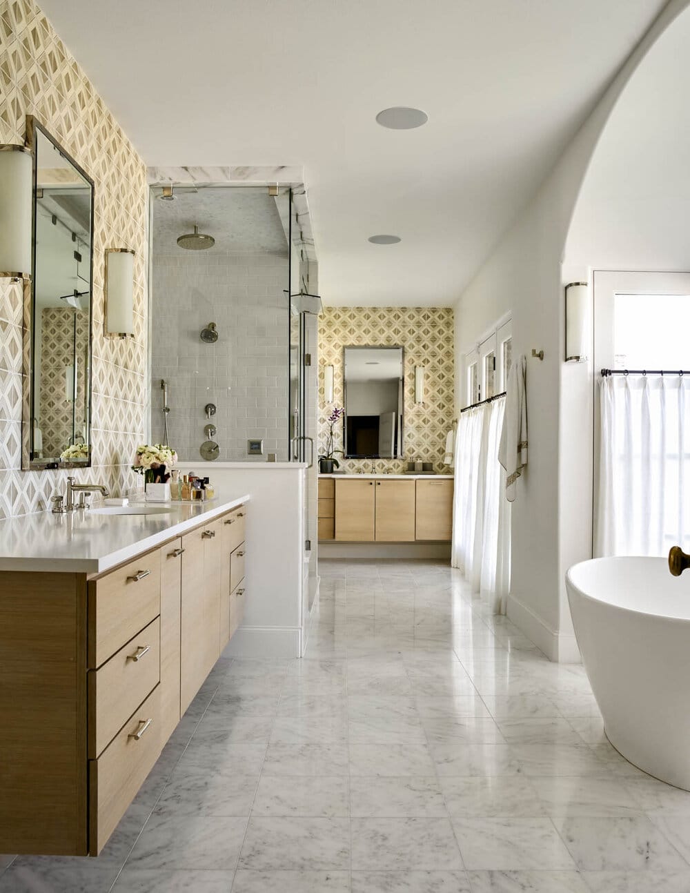 Beautiful interior design from Designer Mary Beth Williams | Photography Nathan Schroder. Love the primary with the abstract wallpaper and marble floors. 