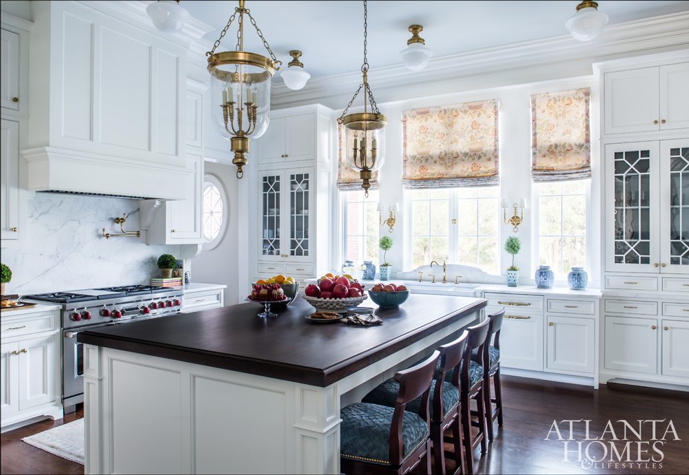 Source: Atlanta Homes & Lifestyles | Architect: C. Brandon Ingram | Interior Design: Mallory Mathison | Photography:  Jeff Herr - white kitchen with hanging pendants and wood island. kitchen design - kitchen ideas - kitchen remodel - extraordinary