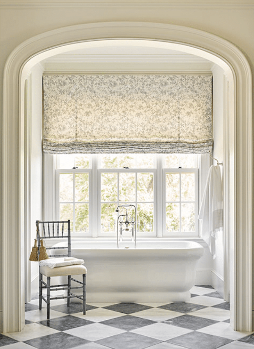 Barbara Westbrook Interior Design | Emily Followill Photography - house tour - Tennessee farmhouse - farmhouse - bathroom - bathroom decor - bathroom ideas - marble floors - black and white marble floors - freestanding tub - arch