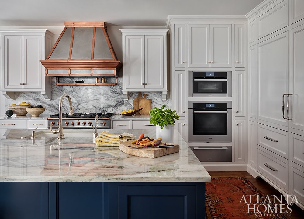 Source: Atlanta Homes & Lifestyles | Interior Design:  Jackye Lanham | Architect:  Andrew Cogar, David VanGroningen and Connor Bingham of Historical Concepts  | Photography: Emily Followill - living room - staircase - Southern Georgian Home -