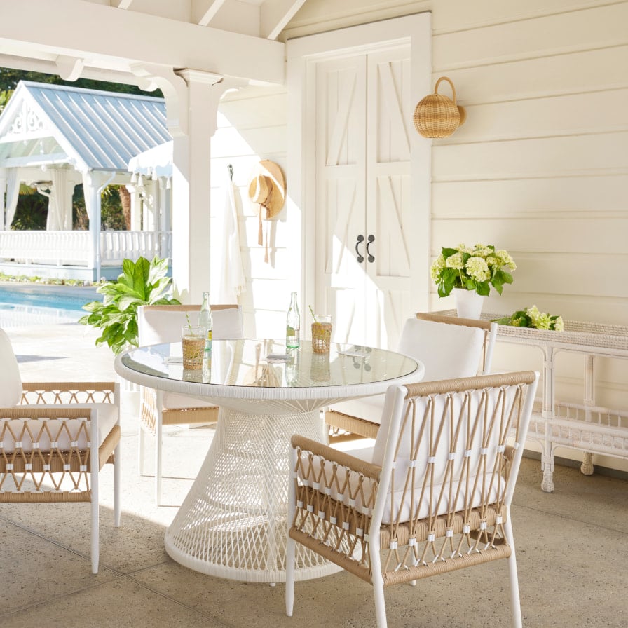 outdoor living - Serena & Lily - round table - covered porch - round pendant