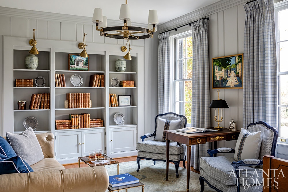 Source: Atlanta Homes & Lifestyles | Interior Design:  Emily Wyatt, Wyatt Designs | Architect:  MabryArch Architecture  | Builder: Revival Construction | Landscape Architect: Jonathan Bussell Landscape Architect | Photography: Jeff Herr | Stylist: Eleanor Roper living room - living room design - blue and white - wood paneling - shiplap