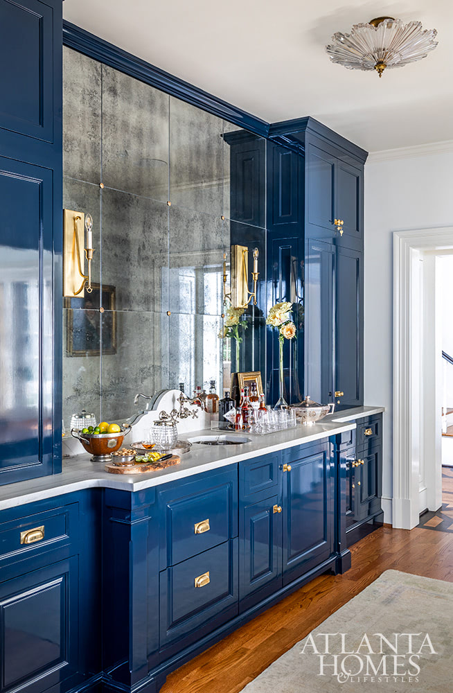 Source: Atlanta Homes & Lifestyles | Interior Design:  Emily Wyatt, Wyatt Designs | Architect:  MabryArch Architecture  | Builder: Revival Construction | Landscape Architect: Jonathan Bussell Landscape Architect | Photography: Jeff Herr | Stylist: Eleanor Roper - bar - stocking the bar - wet bar- antique mirror