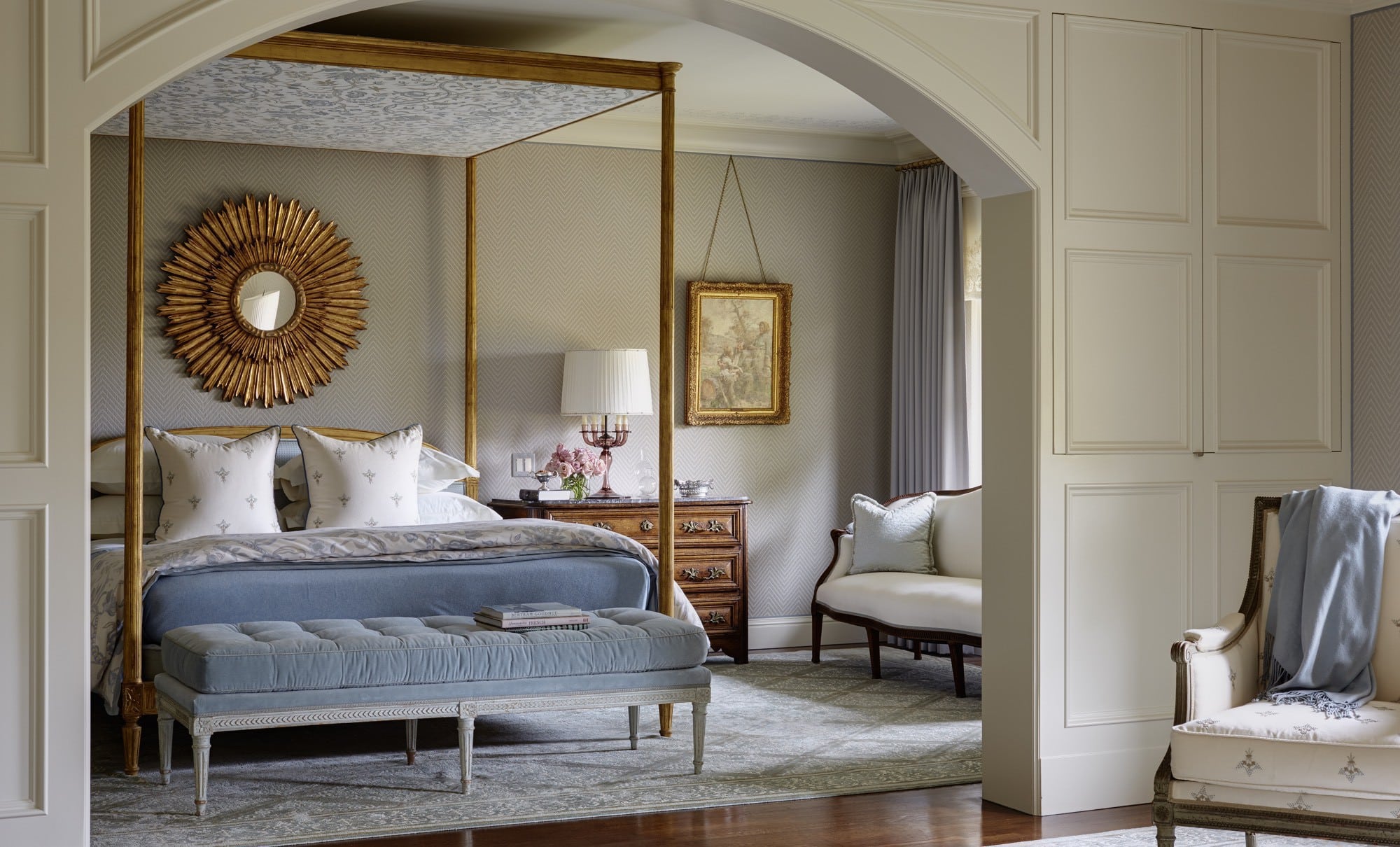 Refined yet laid-back, elegant yet welcoming, Marshall Watson creates beautiful spaces that feel like home. Luke White Photography -bedroom, canopy bed, round mirror, stool at the end of bed