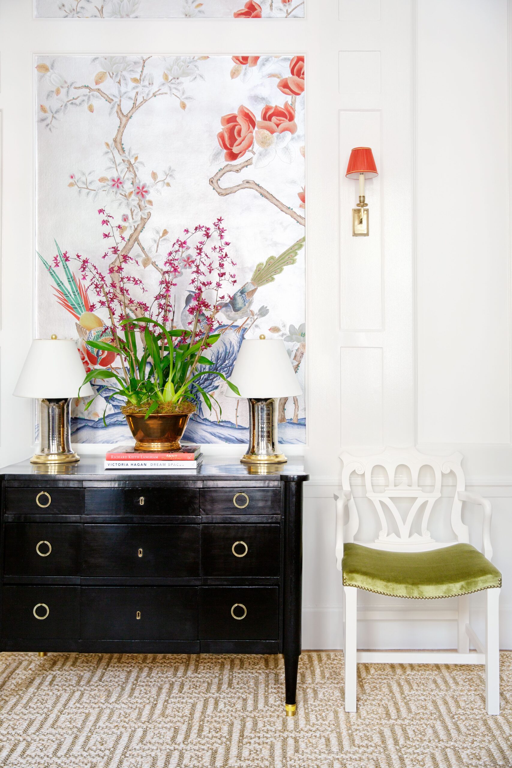 Black chest with modern art above it