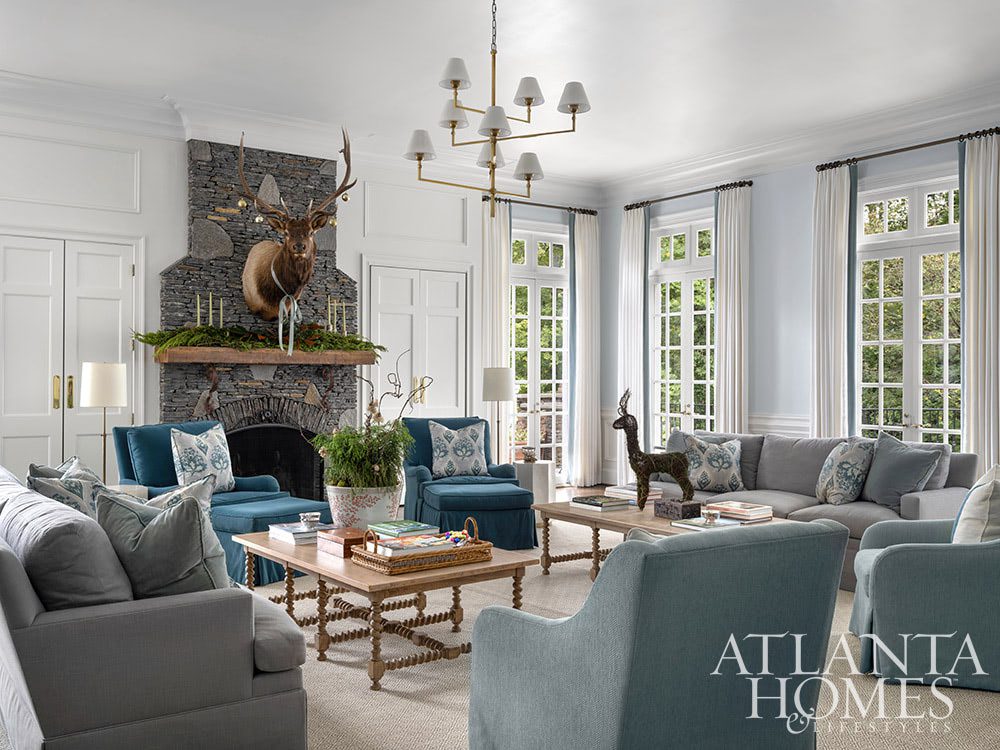 Deck the halls , living room, living room decor, brass chandelier Source: Atlanta Homes & Lifestyle Architect Ross Piper Builder Stuart Grubb Interior Designer Sande Beck Photographer Rustic White Photography