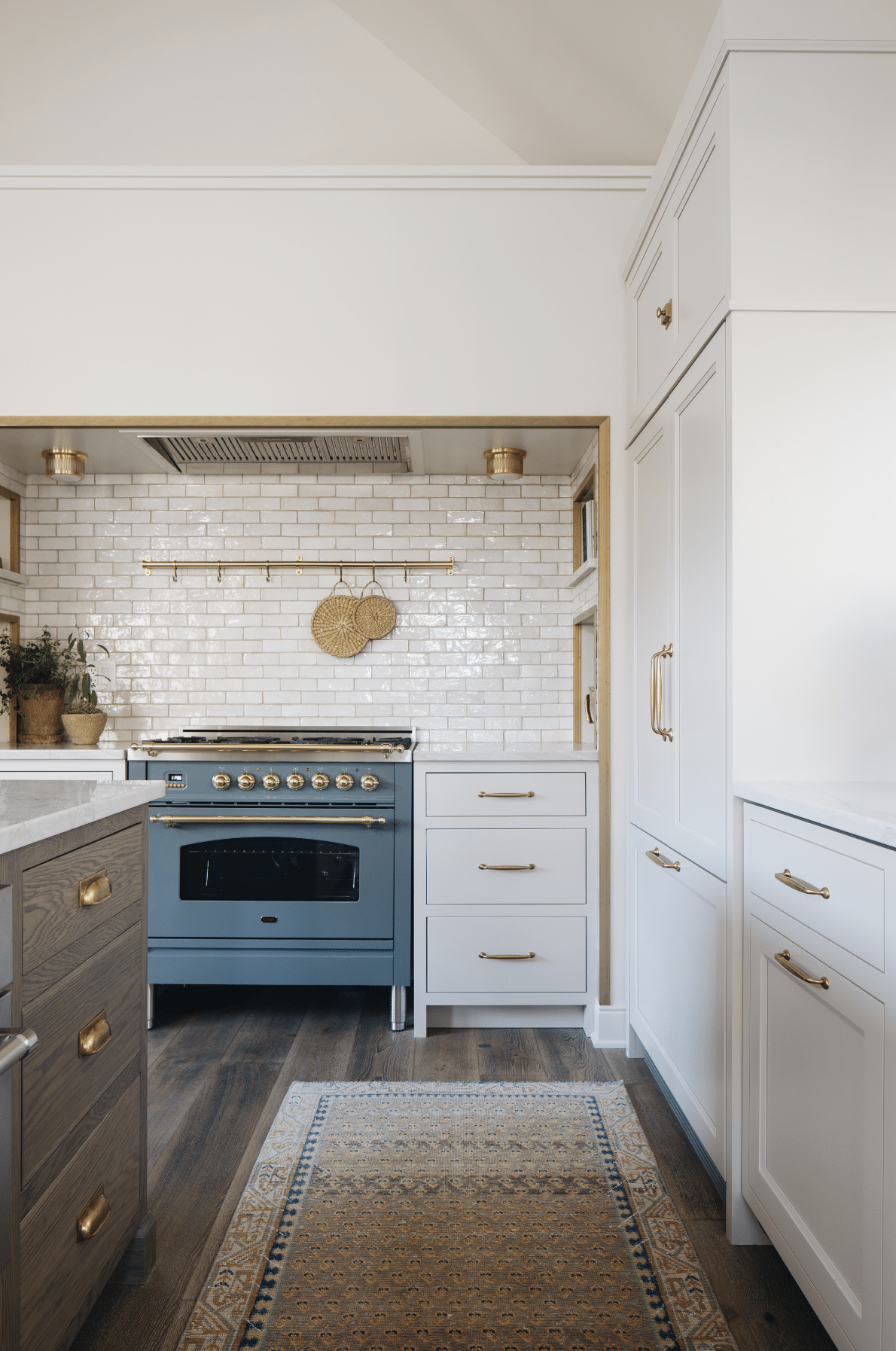 A Jean Stoffer designed lakeside cottage beautifully photography by Stoffer Photography Interiors is a breathtaking transformation that elevated it from a simple dwelling to a haven of serenity.