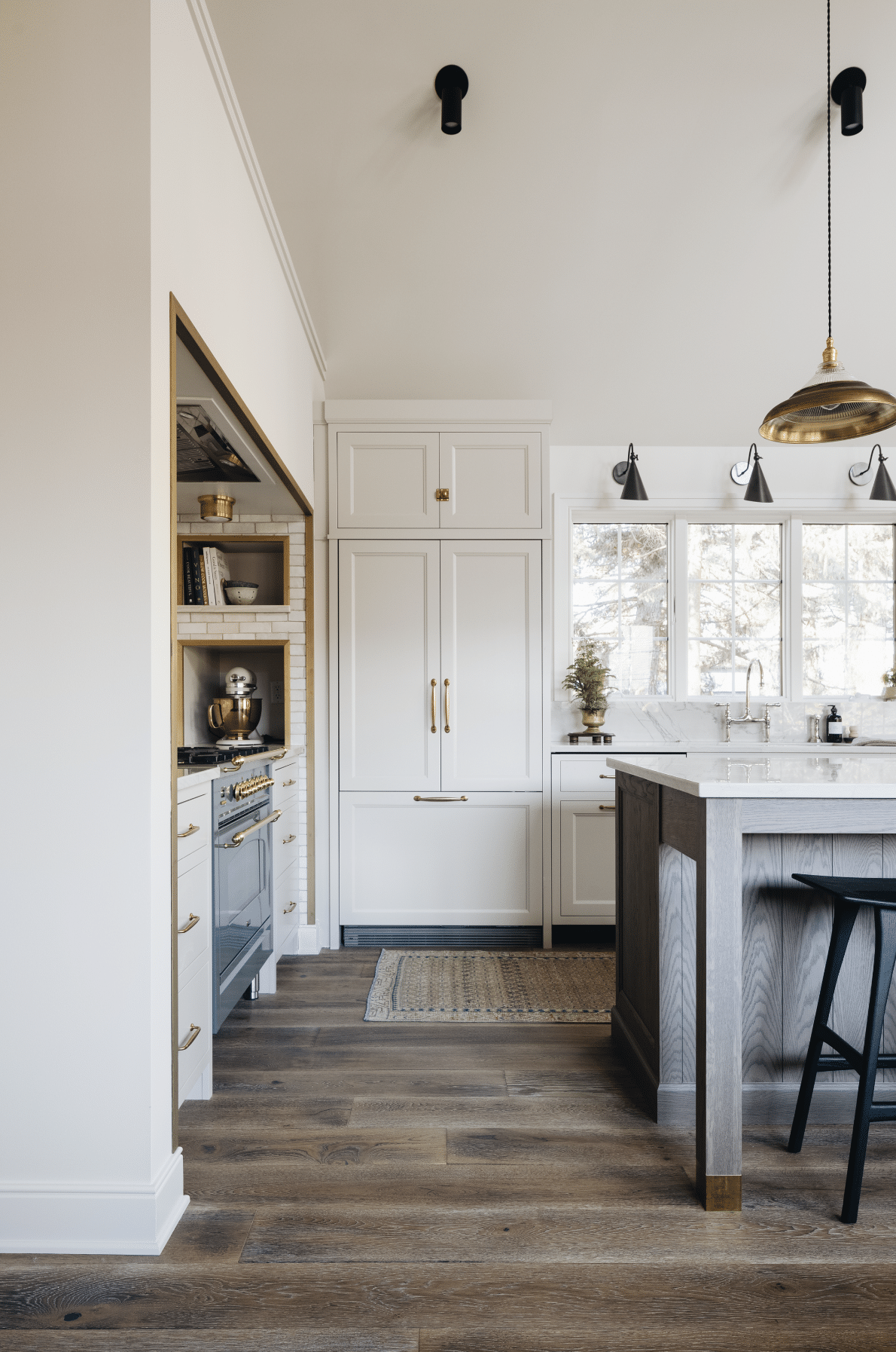 A Jean Stoffer designed lakeside cottage beautifully photography by Stoffer Photography Interiors is a breathtaking transformation that elevated it from a simple dwelling to a haven of serenity.