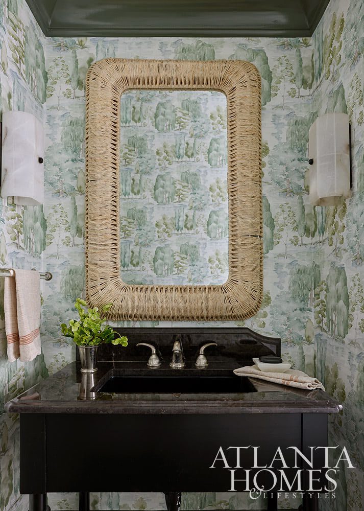 Source: Atlanta Homes & Lifestyles Magazine Photography: Emily Followill Stylist: Thea Beasley - Beautiful foyer with staircase The transformation of a 1960s ranch by Architect Norman Askins and Bradford Lowry Interiors  is a beautiful home - love the wicker mirror in the bathroom