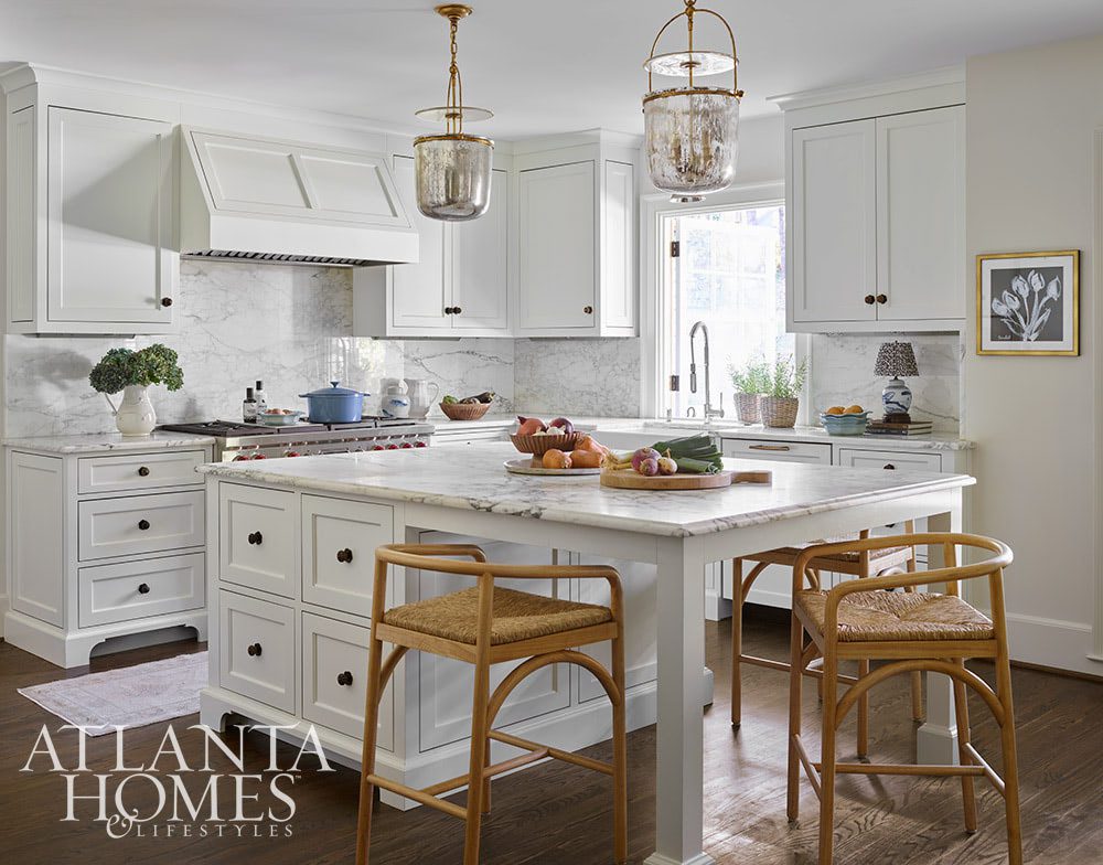 Source: Atlanta Homes & Lifestyles Magazine Photography: Emily Followill Stylist: Thea Beasley - Beautiful foyer with staircase The transformation of a 1960s ranch by Architect Norman Askins and Bradford Lowry Interiors  is a beautiful family-friendly home remodel.