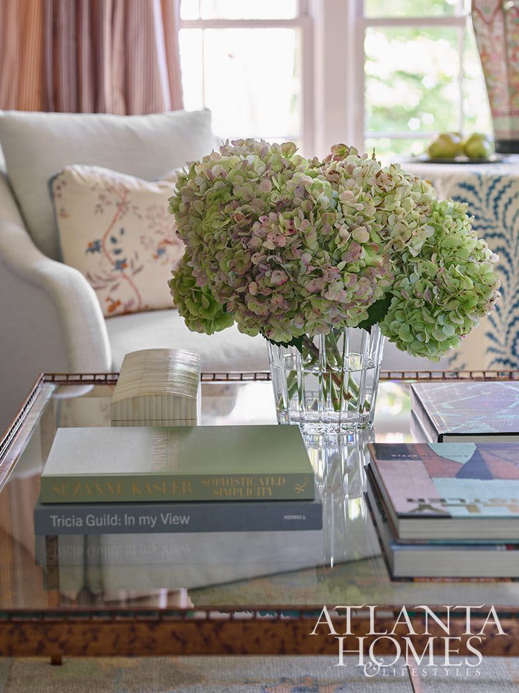 Source: Atlanta Homes & Lifestyles Magazine Photography: Emily Followill Stylist: Thea Beasley - Beautiful foyer with staircase The transformation of a 1960s ranch by Architect Norman Askins and Bradford Lowry Interiors  is a beautiful family-friendly home remodel.