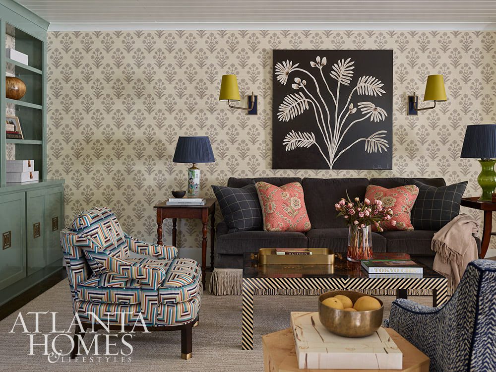 Source: Atlanta Homes & Lifestyles Magazine Photography: Emily Followill Stylist: Thea Beasley - Beautiful foyer with staircase The transformation of a 1960s ranch by Architect Norman Askins and Bradford Lowry Interiors  is a beautiful home - living room with wallpaper