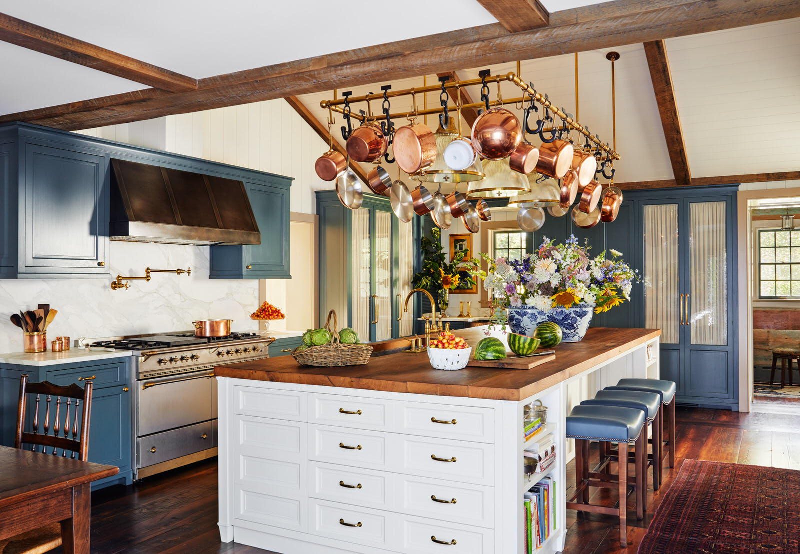The transformation of the kitchen and primary bathroom in this historic waterfront home in Maryland is exceptional. Designer Lilse McKenna masterfully lightened the area, while also honoring the character of the original 1750's home. A sense of history pervades and well-chosen interiors pop in this stunning space full of inspiration. It is the perfect mix of traditional touches and updated details, well-suited for family, entertaining and more, beautifully photographed by Read McKendree.