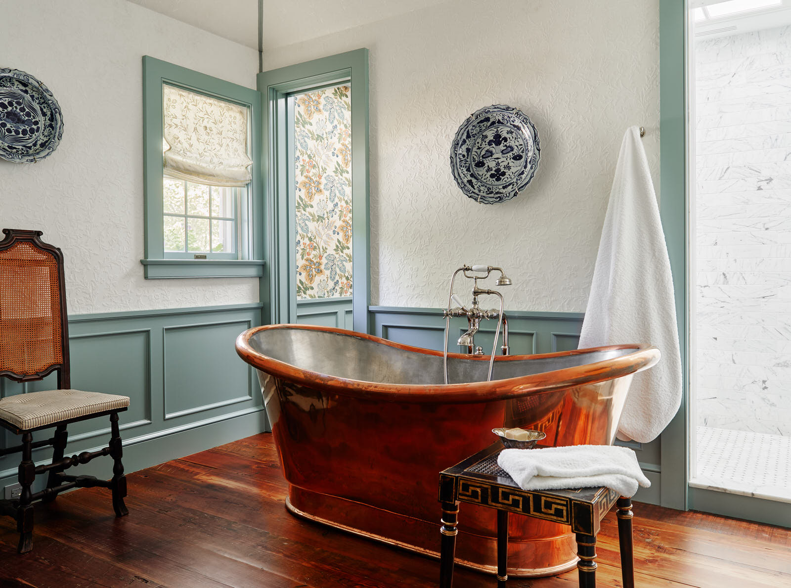 The transformation of the kitchen and primary bathroom in this historic waterfront home in Maryland is exceptional. Designer Lilse McKenna masterfully lightened the area, while also honoring the character of the original 1750's home. A sense of history pervades and well-chosen interiors pop in this stunning space full of inspiration. It is the perfect mix of traditional touches and updated details, well-suited for family, entertaining and more, beautifully photographed by Read McKendree.