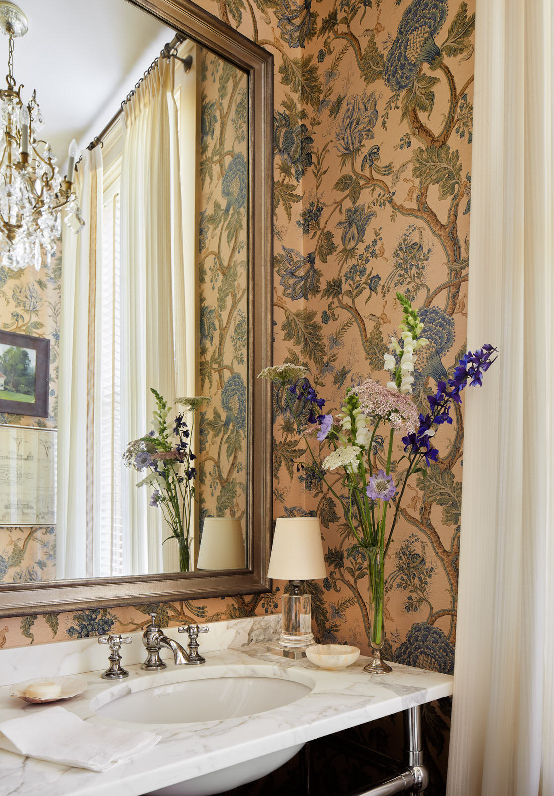 The transformation of the kitchen and primary bathroom in this historic waterfront home in Maryland is exceptional. Designer Lilse McKenna masterfully lightened the area, while also honoring the character of the original 1750's home. A sense of history pervades and well-chosen interiors pop in this stunning space full of inspiration. It is the perfect mix of traditional touches and updated details, well-suited for family, entertaining and more, beautifully photographed by Read McKendree.