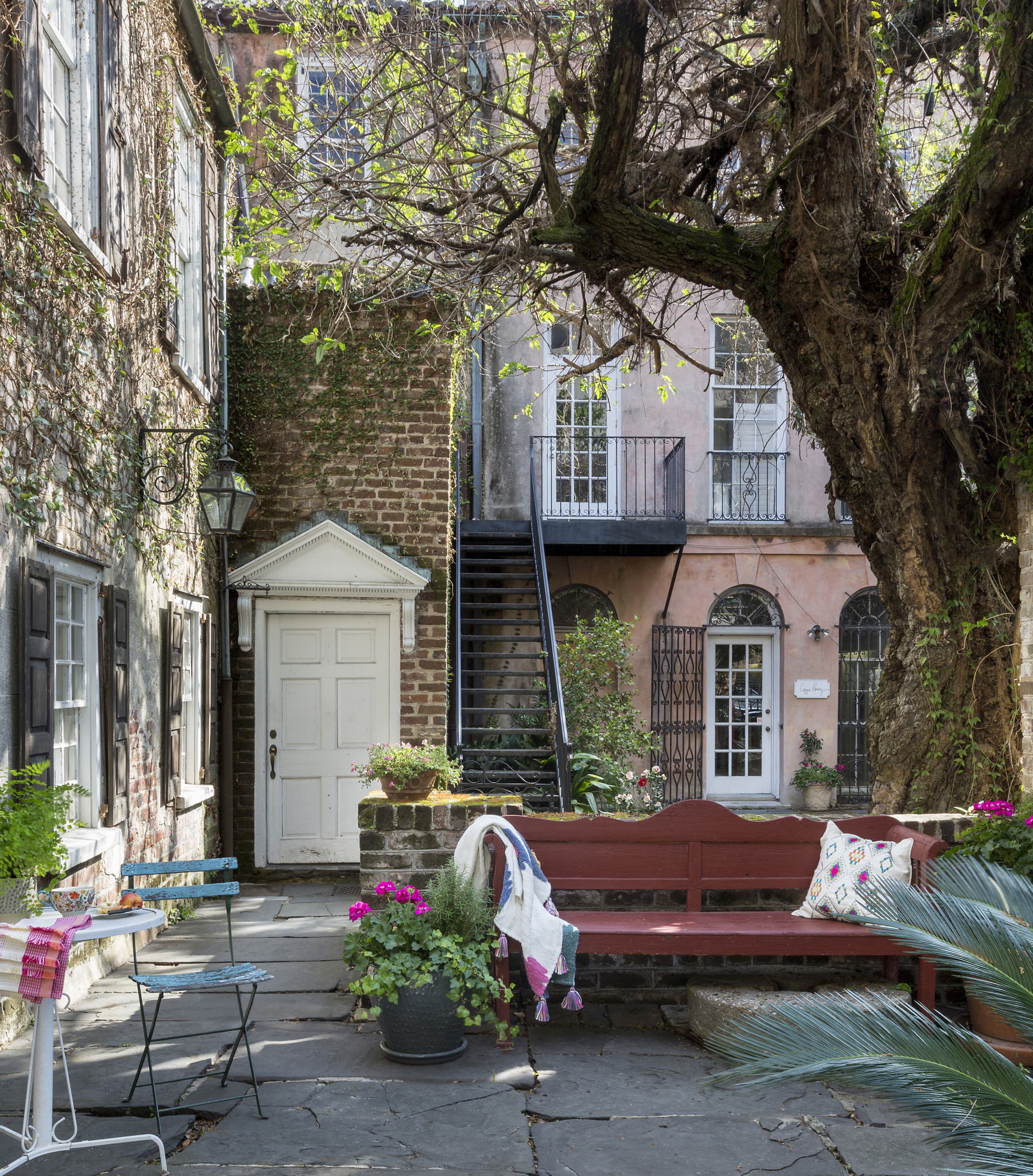 f you've ever dreamed of having your own pied-à-terre brimming with character, we have just the tour for you today!  Located in the enchanting city of Charleston, SC,  this retreat designed by Michael Mitchell is a special getaway for a  couple from Greenville.Photographer: Nancy Nolan Stylist: Ellen Scruggs