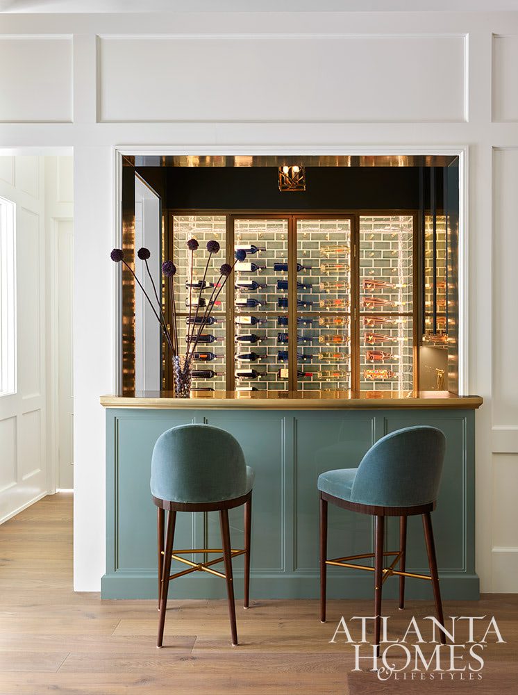 We talk a lot on Design Chic about combining the old with the new. Grandmother's silver on your Saarinen table, fun buffet lamps on an antique buffet, a new, shiny bar cart filled with Grandfather's decanters. There are so many fantastic ways to incorporate the old with the new on the inside. INTERIOR DESIGN:  Suzanne Kasler  RESIDENTIAL DESIGNER:  Castro Design Studio  BUILDER:  Ladisic Fine Homes LANDSCAPE DESIGN:  Land Plus KITCHEN AND CLOSET DESIGN:  Design Galleria Kitchen and Bath Studio  - breathtaking Atlanta home