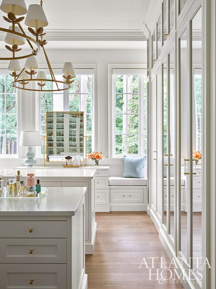 We talk a lot on Design Chic about combining the old with the new. Grandmother's silver on your Saarinen table, fun buffet lamps on an antique buffet, a new, shiny bar cart filled with Grandfather's decanters. There are so many fantastic ways to incorporate the old with the new on the inside. INTERIOR DESIGN:  Suzanne Kasler  RESIDENTIAL DESIGNER:  Castro Design Studio  BUILDER:  Ladisic Fine Homes LANDSCAPE DESIGN:  Land Plus KITCHEN AND CLOSET DESIGN:  Design Galleria Kitchen and Bath Studio - breathtaking Atlanta home