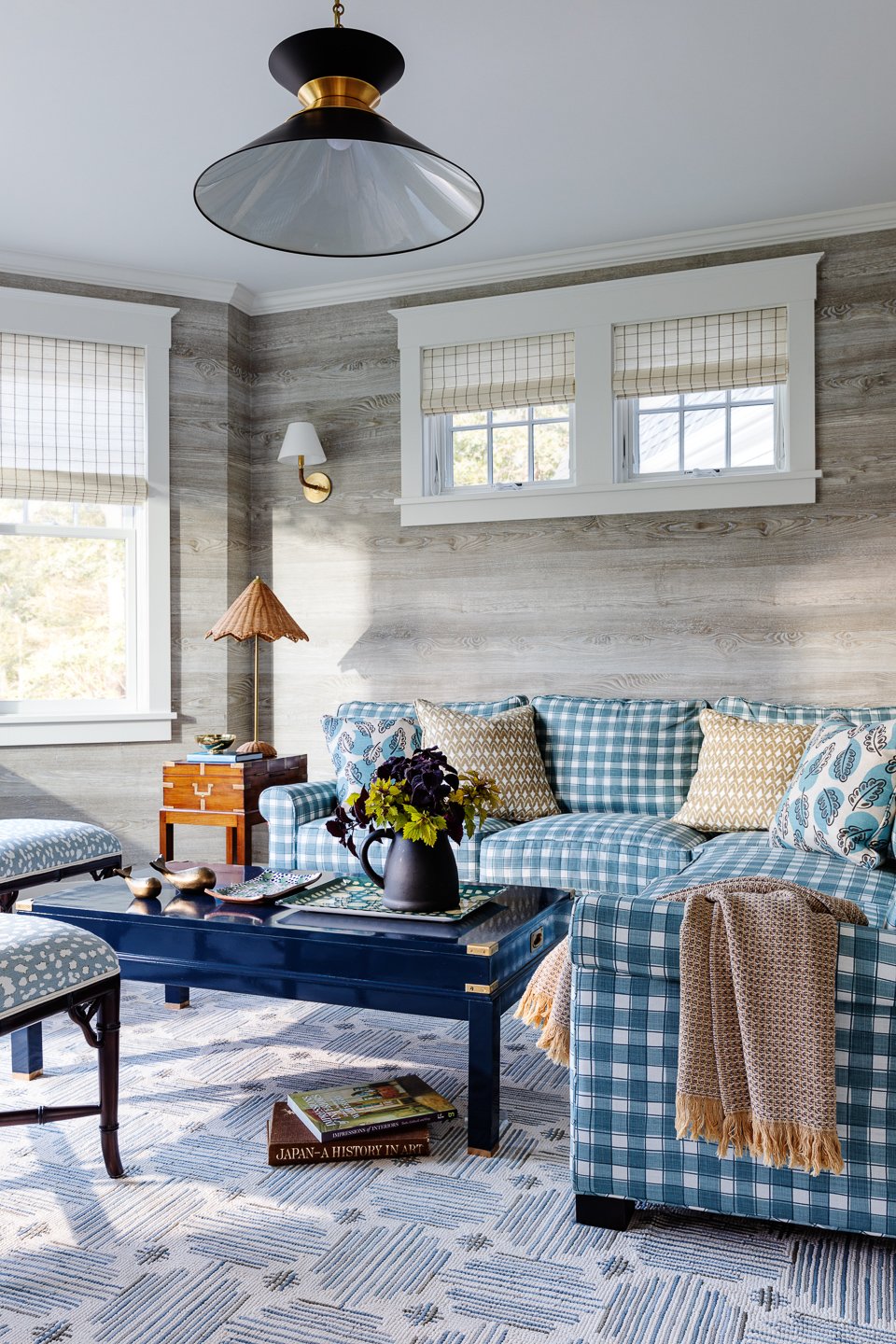 Digs Design Company is celebrated for its distinctive approach to interior design, including chic and inviting living rooms. The hallmark of their designs often lies in a carefully curated color palettes, where blues, tans, and fresh tones set the stage for a timeless and soothing feel.  Greg Premru Photography