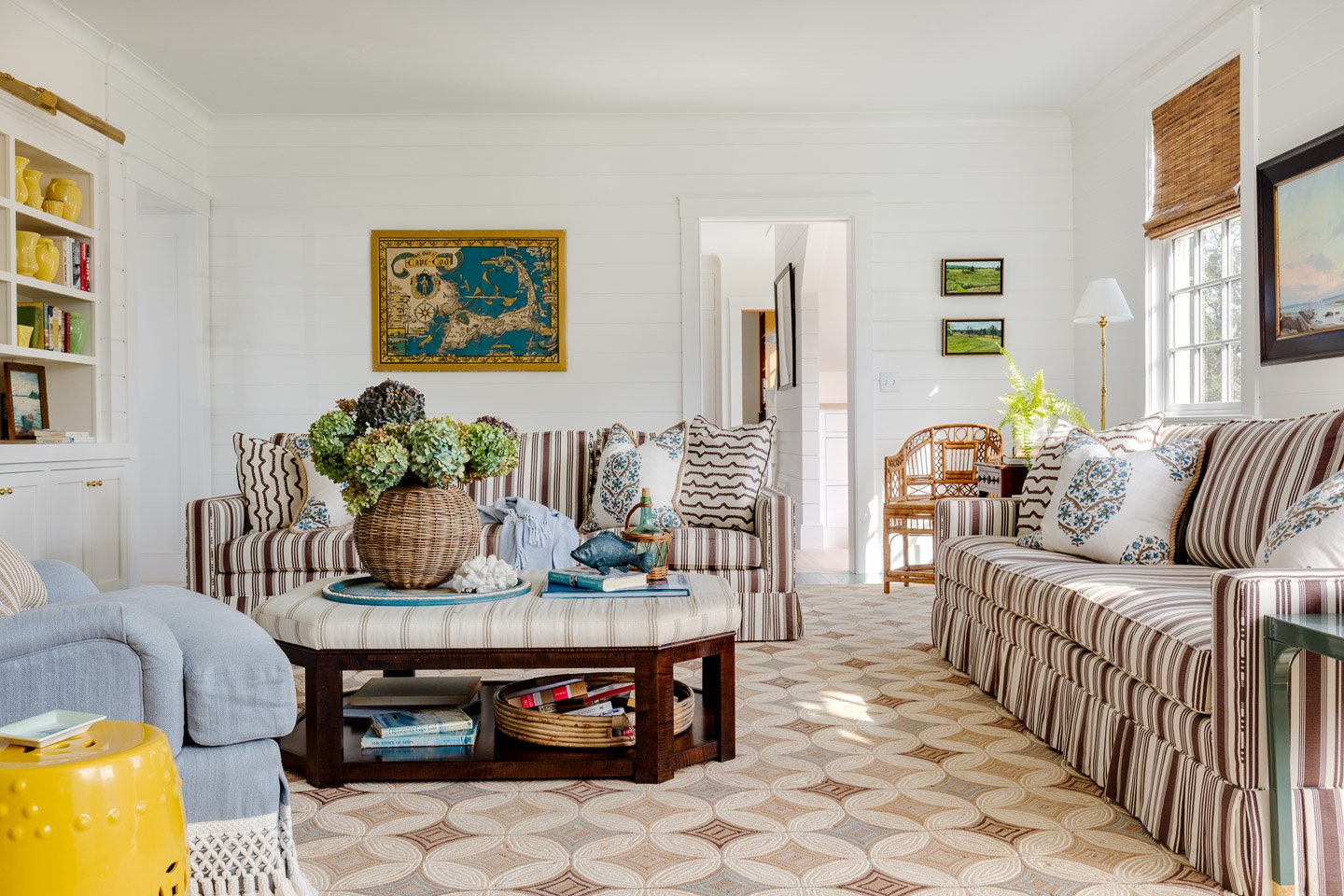 Digs Design Company is celebrated for its distinctive approach to interior design, including chic and inviting living rooms. The hallmark of their designs often lies in a carefully curated color palettes, where blues, tans, and fresh tones set the stage for a timeless and soothing feel.  Greg Premru Photography
