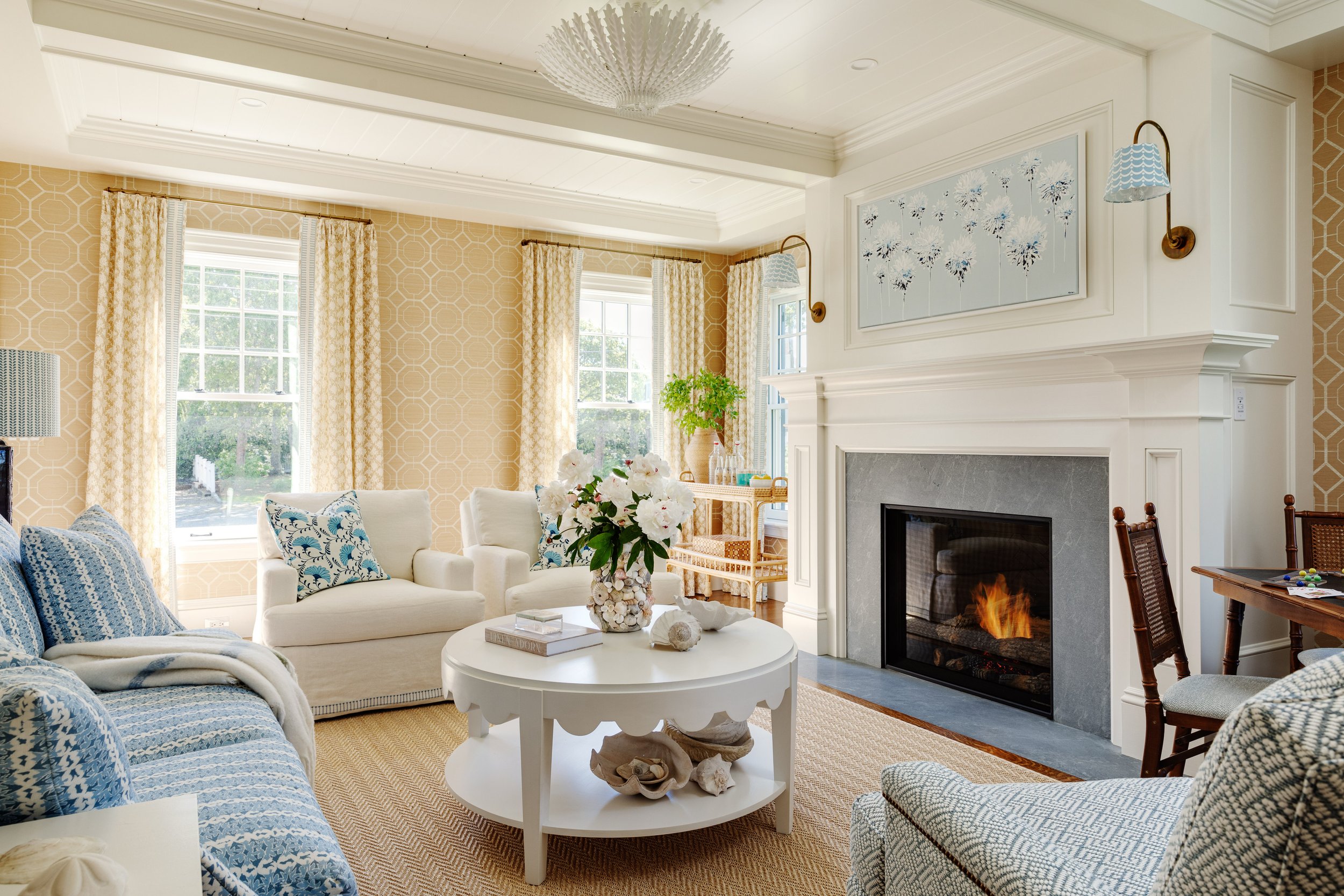 Digs Design Company is celebrated for its distinctive approach to interior design, including chic and inviting living rooms. The hallmark of their designs often lies in a carefully curated color palettes, where blues, tans, and fresh tones set the stage for a timeless and soothing feel.  Greg Premru Photography