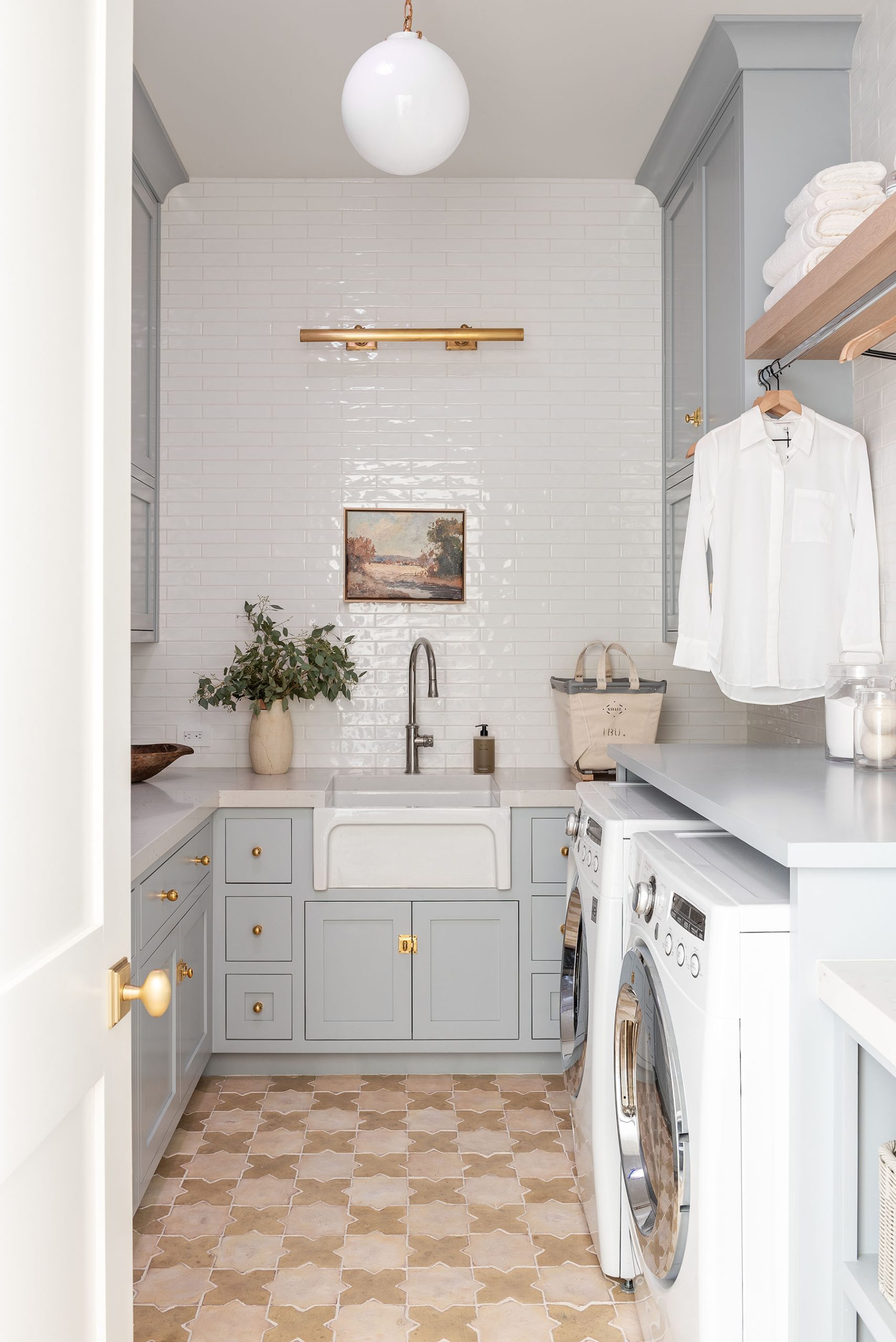 Discover expert tips, creative ideas, and smart organization hacks to create stylish laundry rooms that inspire you! Lucy Call Photography - Studio McGee Design