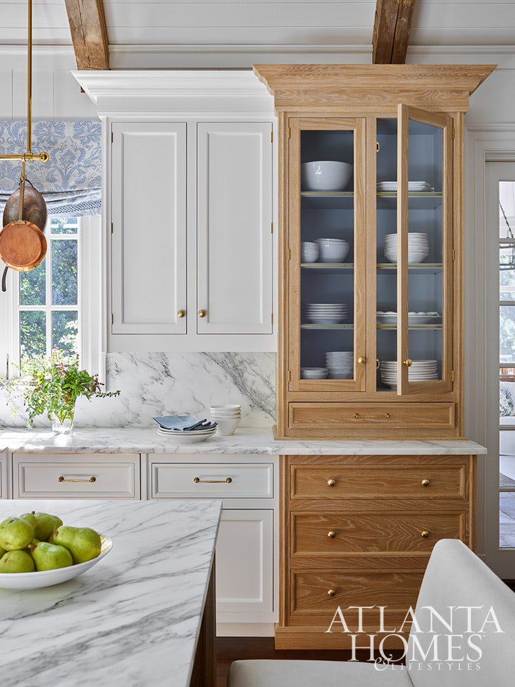 Today we are so excited to showcase a stunning kitchen remodel designed by the talented duo of cabinet designer Christopher Peacock and interior designer Suzanne Kasler.