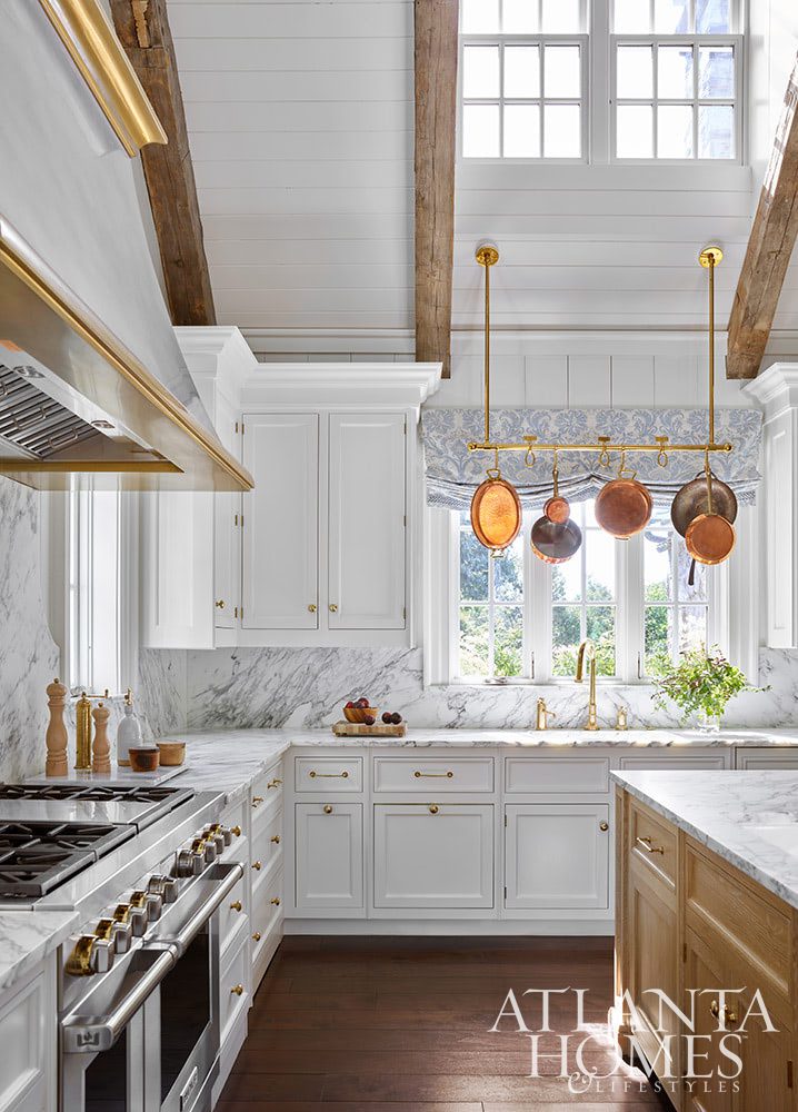 Today we are so excited to showcase a stunning kitchen remodel designed by the talented duo of cabinet designer Christopher Peacock and interior designer Suzanne Kasler.