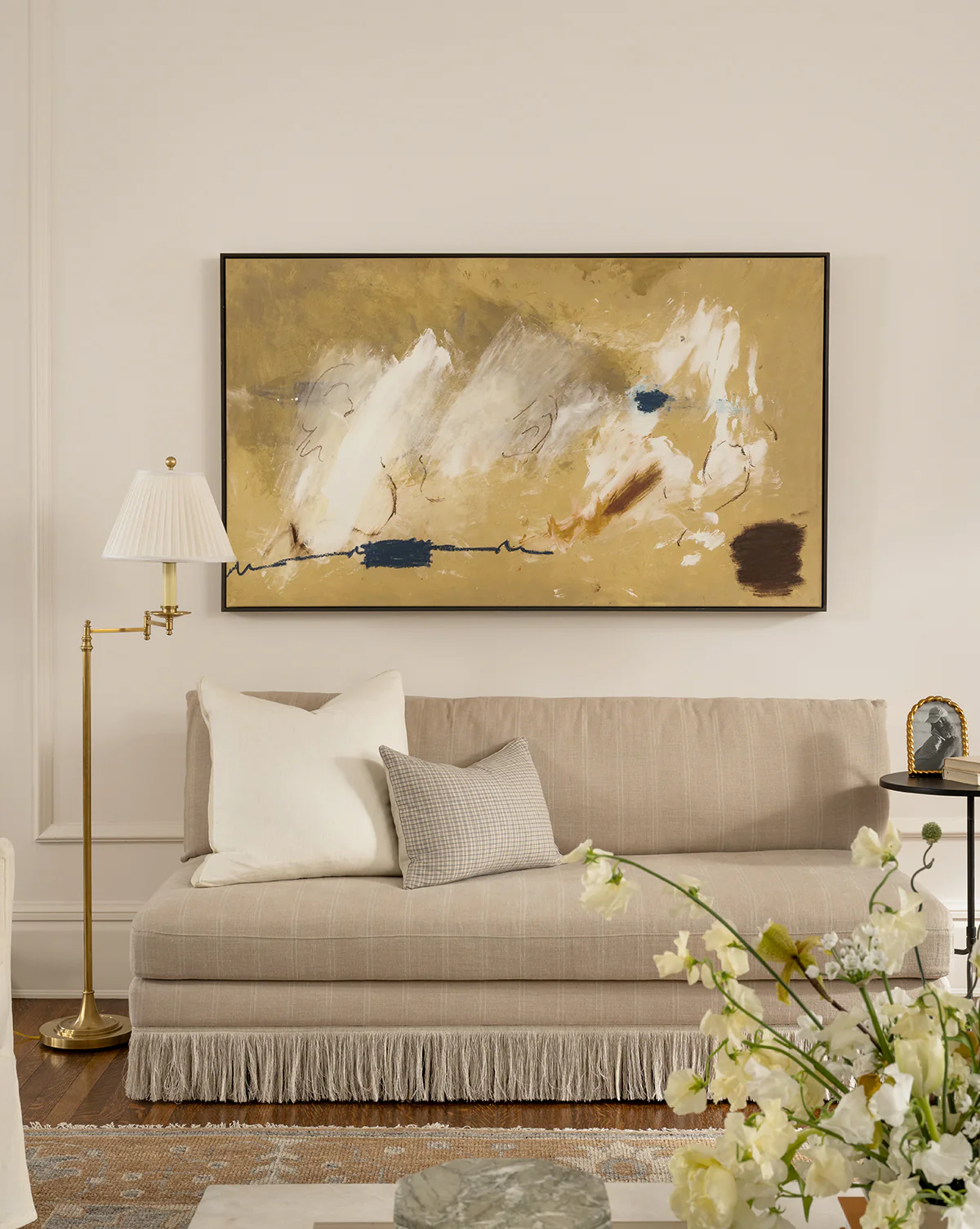 Studio McGee, founded by Shea and Syd McGee, is celebrated for its distinctive approach to interior design, including stunning living rooms. The hallmark of their designs often lies in a carefully curated neutral color palette, where whites, grays, and muted tones set the stage for a timeless and soothing ambiance. Take a peek at 5 of our Studio McGee living rooms we love! Lucy Call Photography