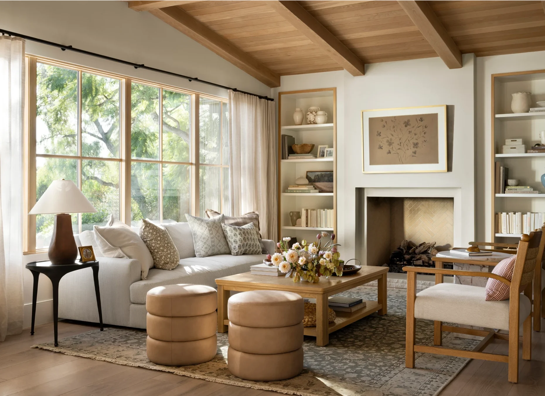 Studio McGee, founded by Shea and Syd McGee, is celebrated for its distinctive approach to interior design, including stunning living rooms. The hallmark of their designs often lies in a carefully curated neutral color palette, where whites, grays, and muted tones set the stage for a timeless and soothing ambiance. Take a peek at 5 of our Studio McGee living rooms we love! Lucy Call Photography