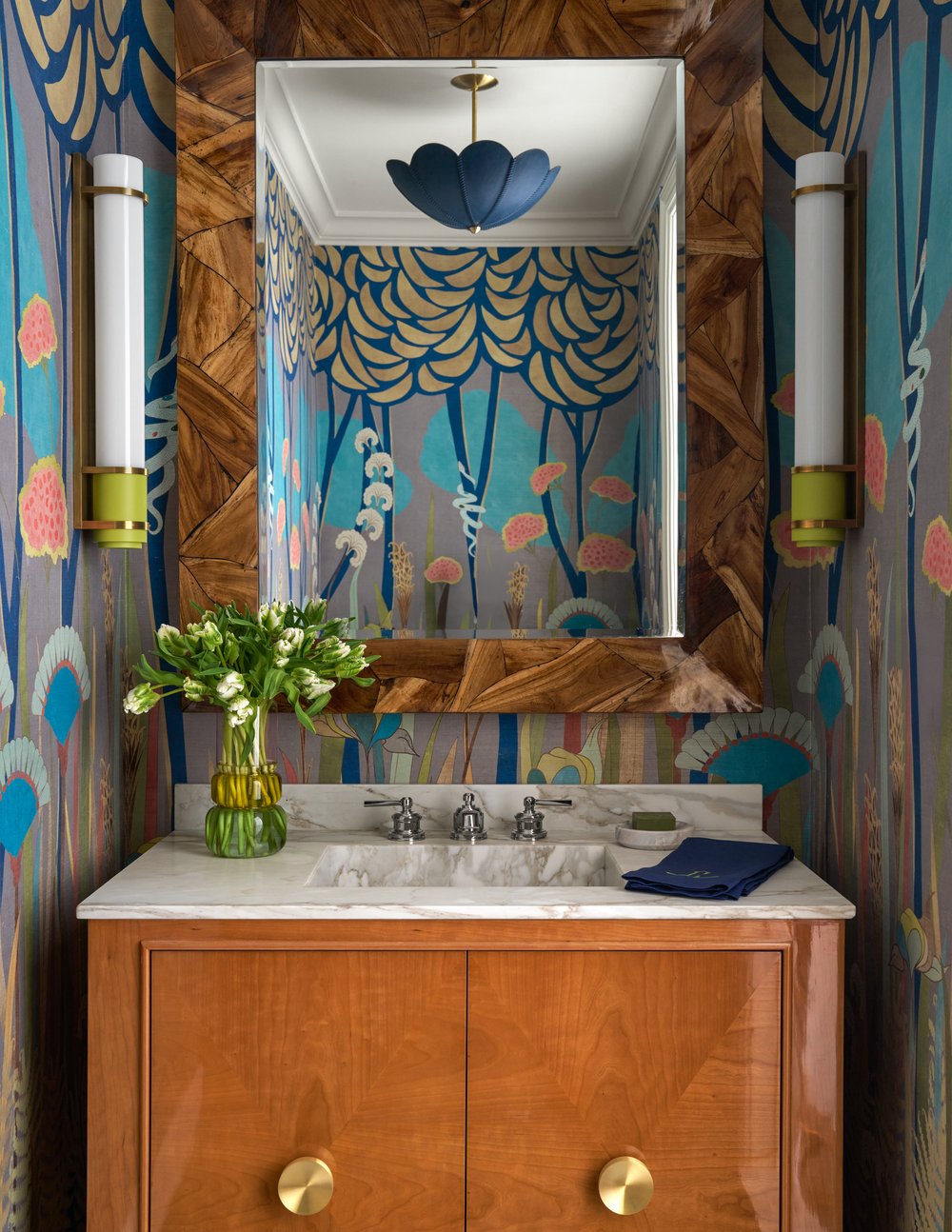 Step inside this Mary Beth Wagner high rise design that is a dream—modern elegance with a whisper of luxury. The beautiful colors and textures tie the space together with effortless grace. Striking abstract art hangs on the walls, chic rugs add understated style to the floors, and wallpaper brings a clean, patterned look to the space—each piece enhancing the home's beauty . Every inch of this home is a testament to Wagner’s gift for weaving comfort and refinement into a space that feels both lived-in and timeless. Nathan Schroder Photography