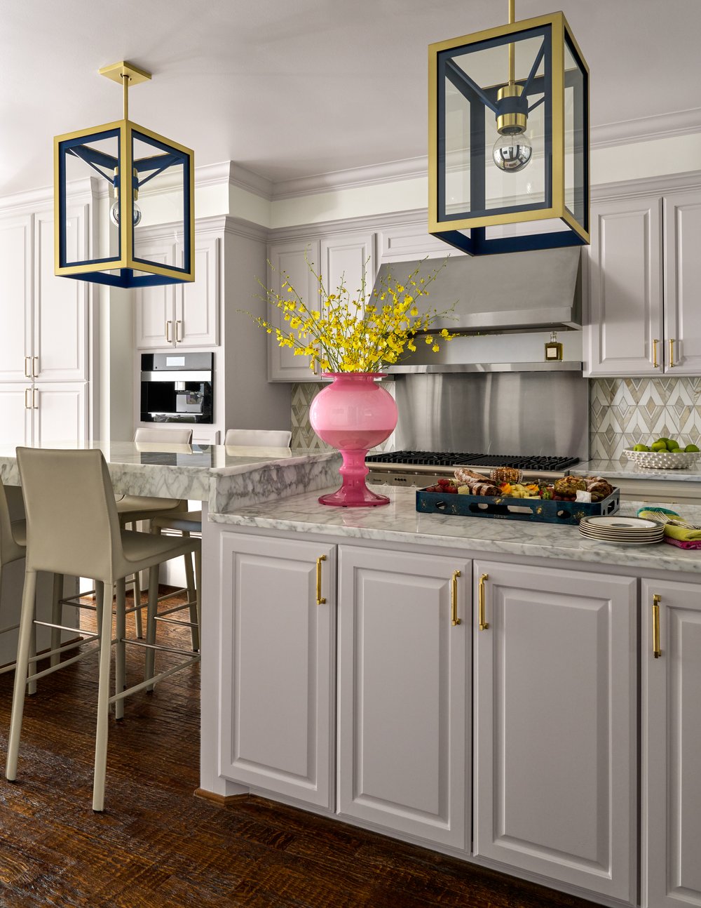 Step inside this Mary Beth Wagner highrise design that is a dream—modern elegance with a whisper of luxury. The beautiful colors and textures tie the space together with effortless grace. Striking abstract art hangs on the walls, chic rugs add understated style to the floors, and wallpaper brings a clean, patterned look to the space—each piece enhancing the home's beauty . Every inch of this home is a testament to Wagner’s gift for weaving comfort and refinement into a space that feels both lived-in and timeless. Nathan Schroder Photography