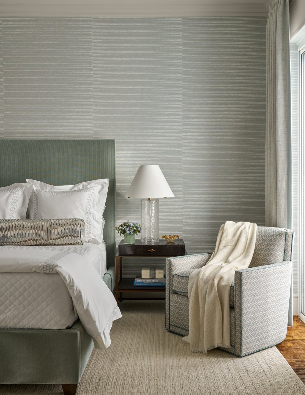 Step inside this Mary Beth Wagner highrise design that is a dream—modern elegance with a whisper of luxury. The beautiful colors and textures tie the space together with effortless grace. Striking abstract art hangs on the walls, chic rugs add understated style to the floors, and wallpaper brings a clean, patterned look to the space—each piece enhancing the home's beauty . Every inch of this home is a testament to Wagner’s gift for weaving comfort and refinement into a space that feels both lived-in and timeless. Nathan Schroder Photography